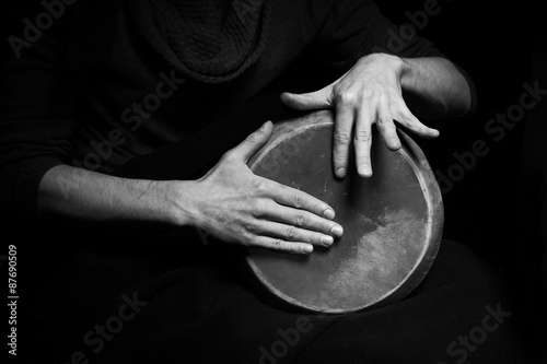 Leinwand Poster black and white photo of hand drum