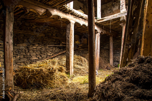 Barn made of stones and wood photo
