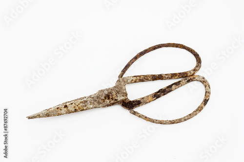 old scissors full of rust isolated on white background © artpritsadee