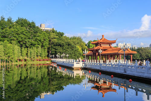 Vintage chinese pavillion over lake