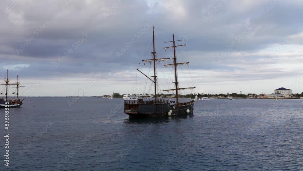 Old wooden frigates are tendered at Grand Cayman Island. Caribbean Sea Old wooden frigates are tendered at Grand Cayman Island. Caribbean Sea