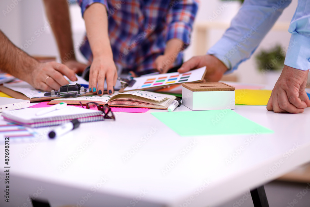 Young business people working at office on new project