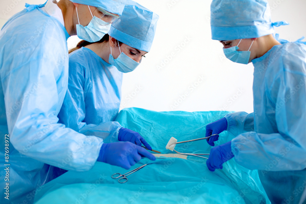 Team surgeon at work in operating room Team surgeon at work in operating room