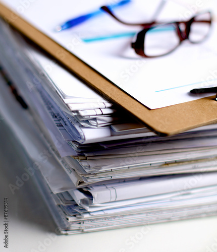 Big stack of papers ,documents on the desk