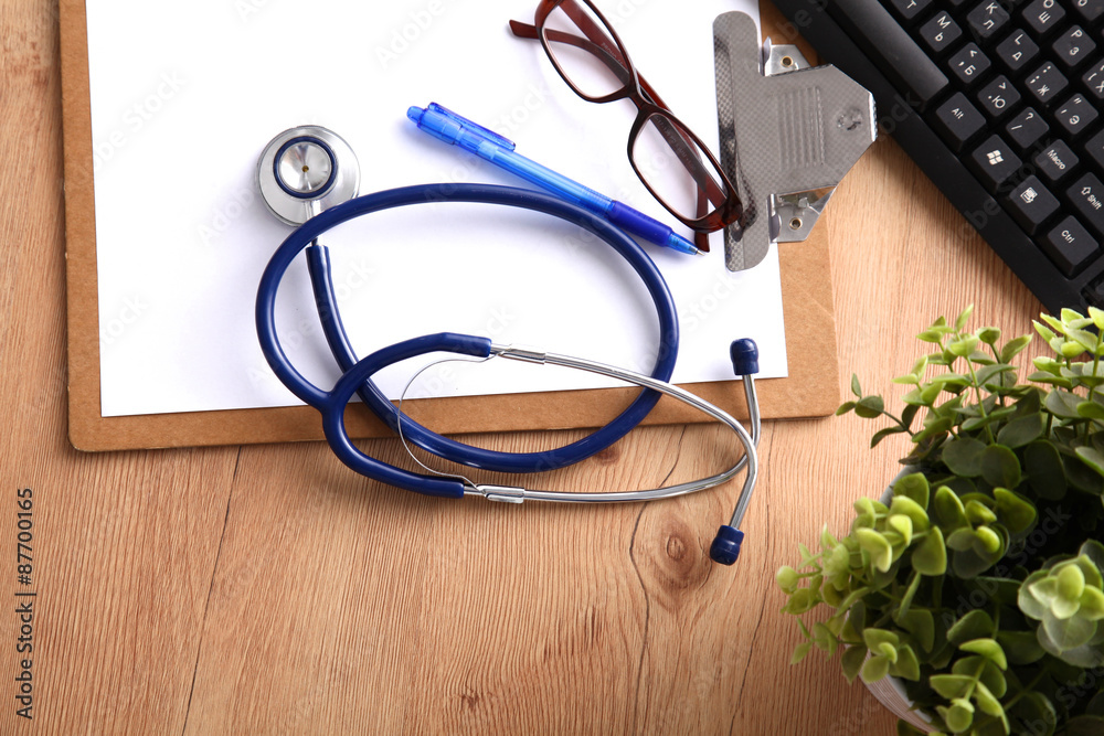 Stethoscope on laptop keyboard. Concept 3D image Stethoscope on laptop keyboard. Concept 3D image