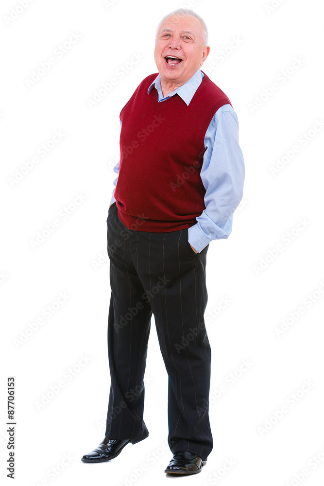 Surprised and happy senior old man, hands in pockets, looks at camera, wearing cardigan marsala color and shirt, isolated on white. Human emotions and facial expressions. Education concept Surprised and happy senior old man, hands in pockets, looks at camera, wearing cardigan marsala color and shirt, isolated on white. Human emotions and facial expressions. Education concept
