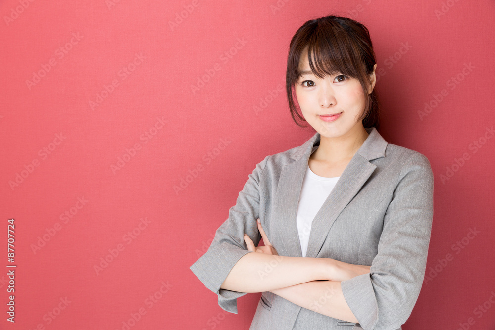 portrait of asian businesswoman on red background portrait of asian businesswoman on red background