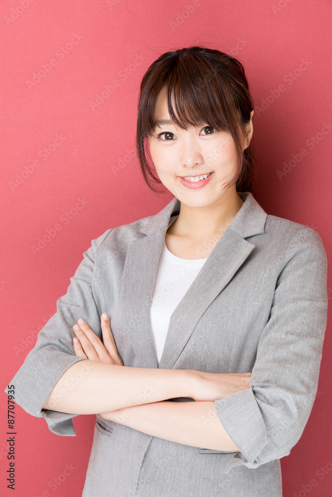 portrait of asian businesswoman on red background portrait of asian businesswoman on red background