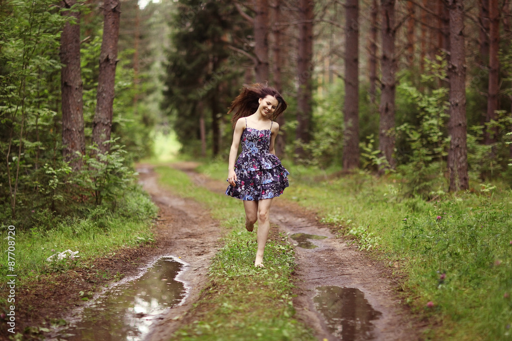Obraz premium running girl forester in nature