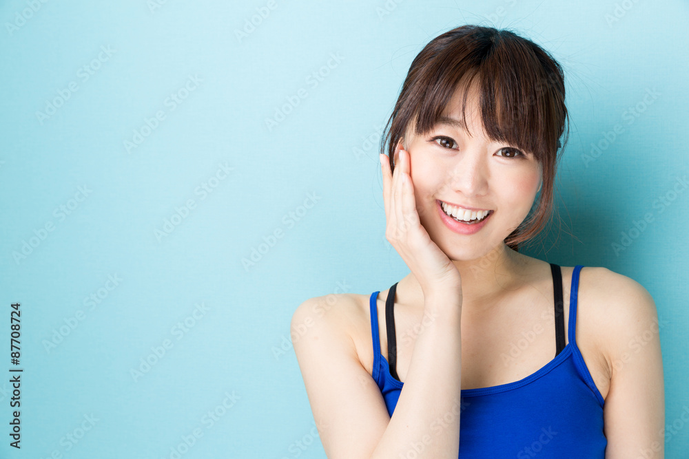 attractive asian woman beauty image on blue background attractive asian woman beauty image on blue background