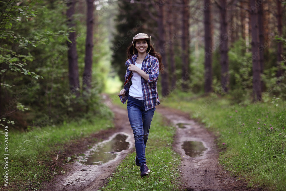 Obraz premium running girl forester in nature