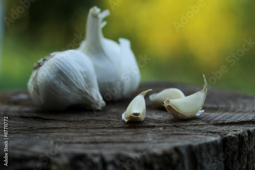 Garlic on wooden plank