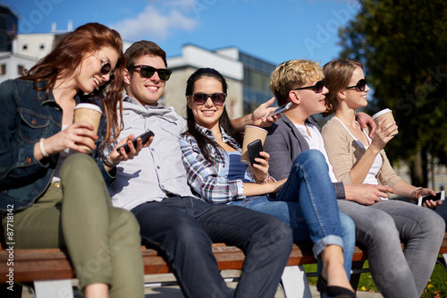 group of students or teenagers drinking coffee