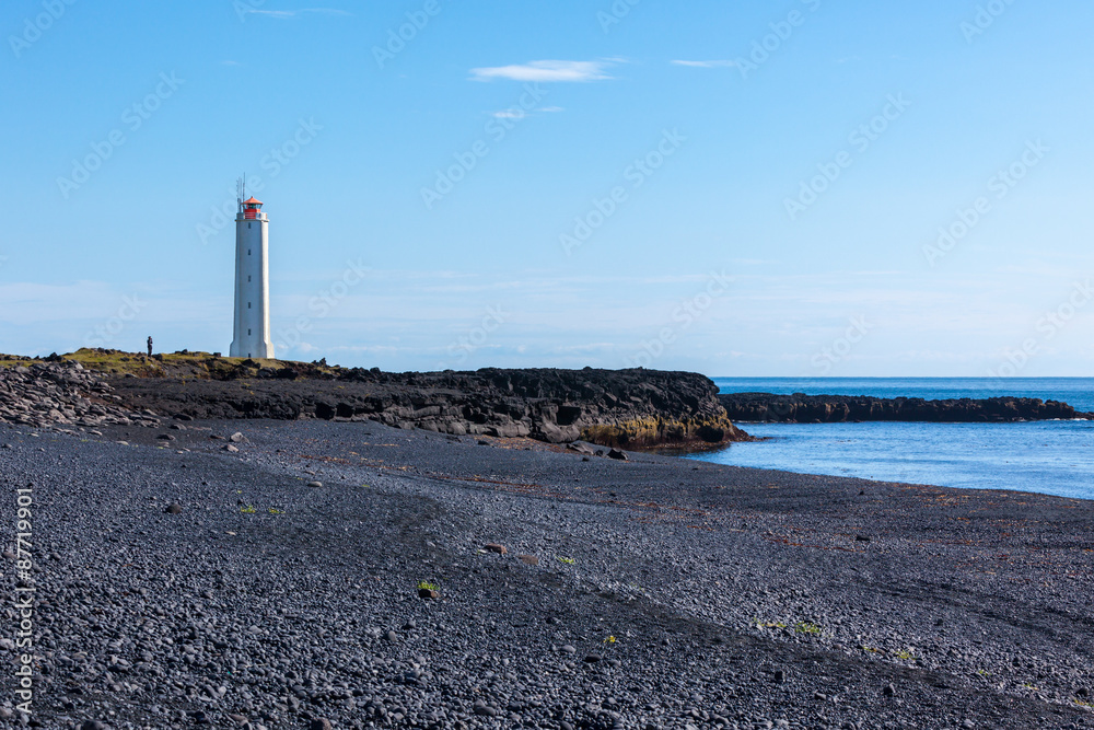 Lighthouse in West Iceland at sunny weather