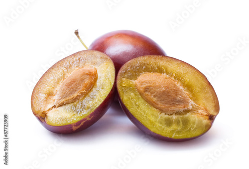 Plums isolated on white background