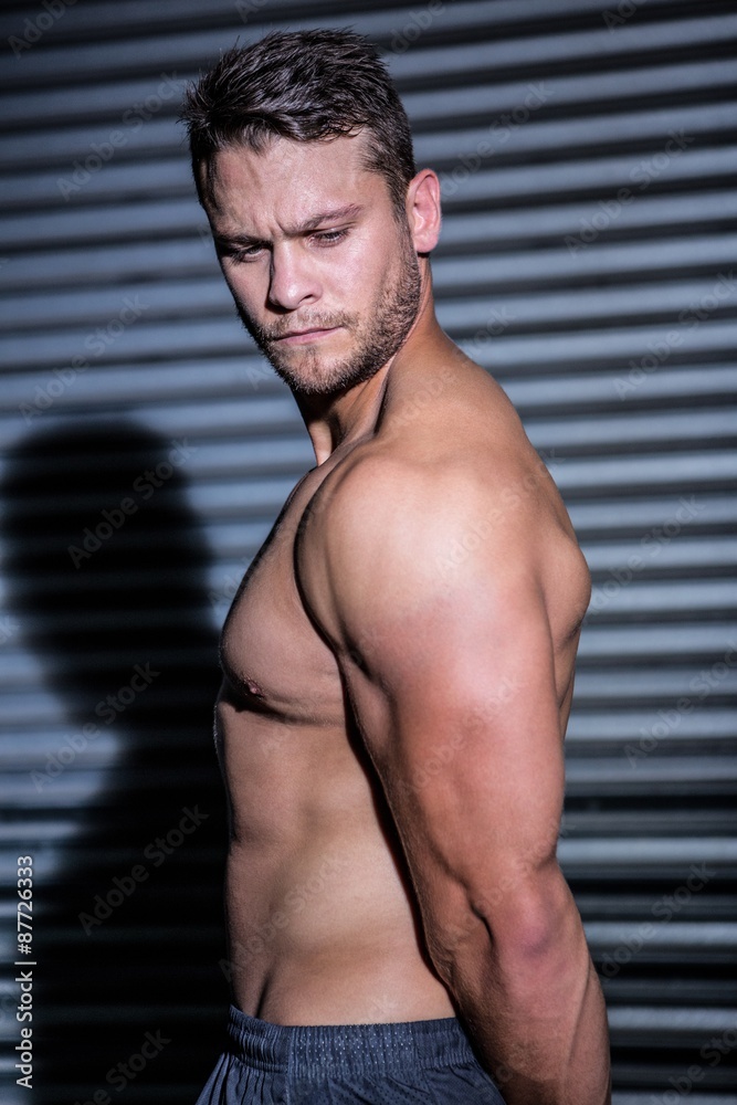 Obraz premium Serious muscular man 