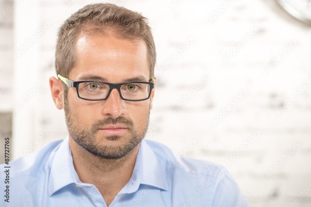 Fototapeta premium portrait of a young businessman with eyeglasses