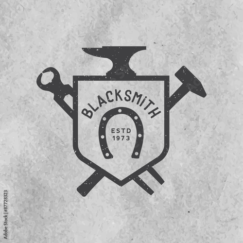 blacksmith emblem with grunge texture on old paper background