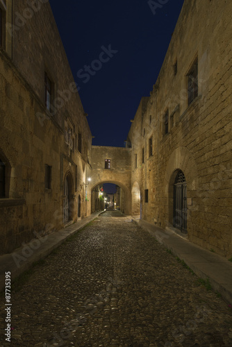 Medieval Avenue of the Knights at night  a cobblestone street in Rhodes Citadel   Greece