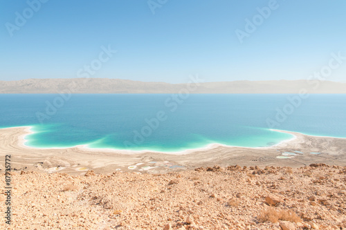 Exotic landscape Dead Sea shoreline aerial view with mountains