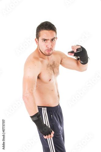 tough martial arts fighter wearing black shorts and wristband © Fotos 593
