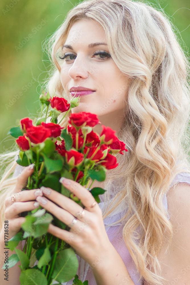 beauty woman portrait with a bouquet of red roses beauty woman portrait with a bouquet of red roses
