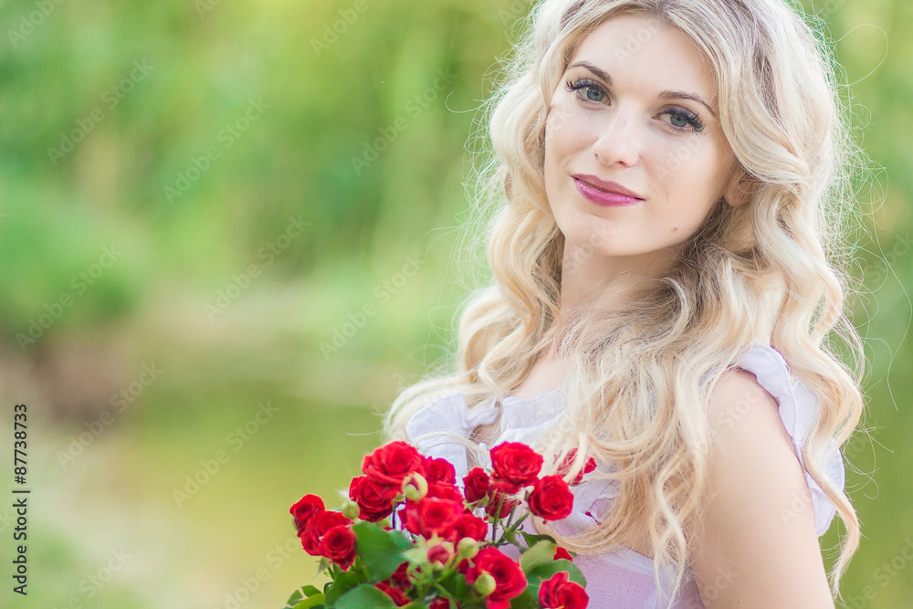 beauty woman portrait with a bouquet of red roses beauty woman portrait with a bouquet of red roses