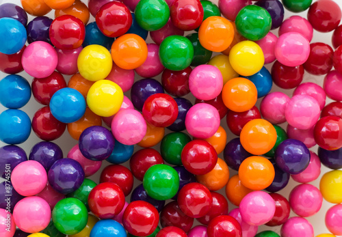 horizontal image of a background shot of colourful  array of bubble gum filling the whole composition