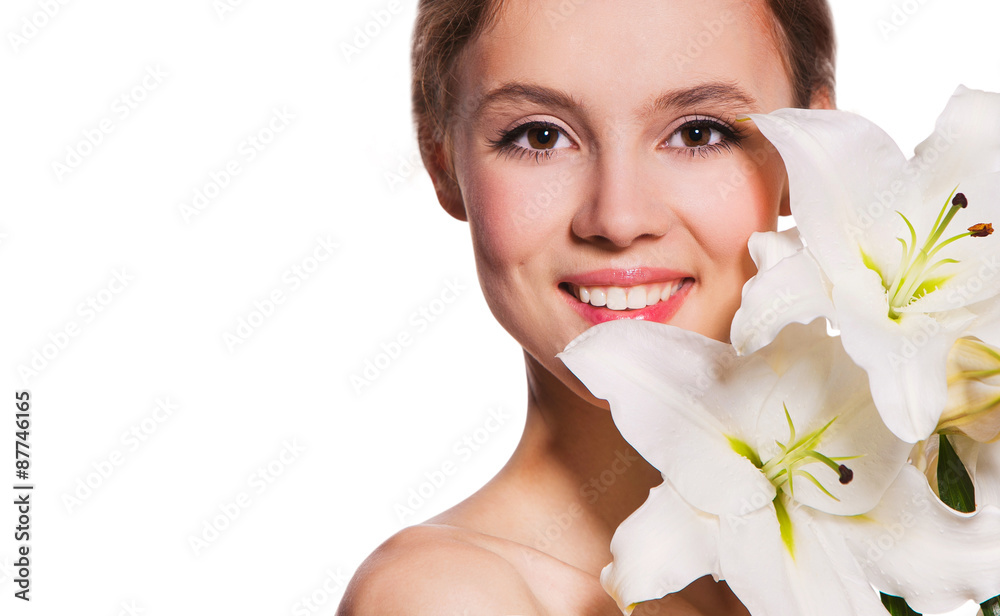 beauty portrait of a beautiful girl with fresh flower lily. 