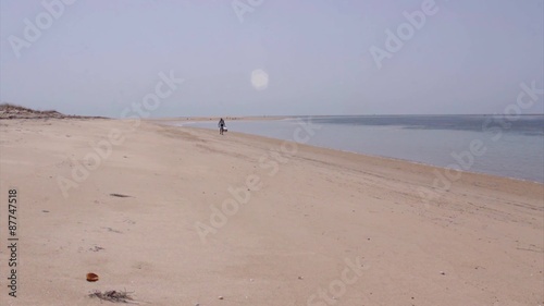 Tourists at Armona cost beach, Algarve, southern Portugal.