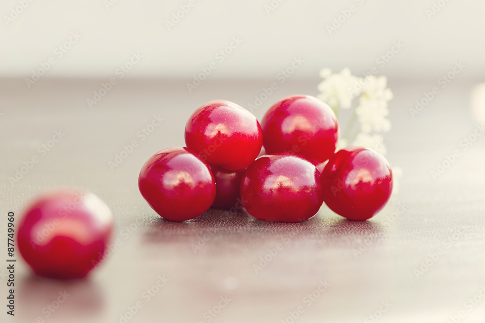 Red cherry and white flower Red cherry and white flower