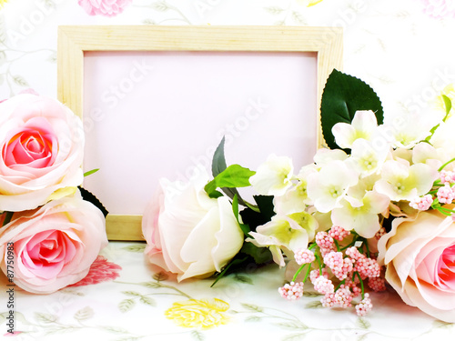 wood frame ande pink roses with red velvet box on sweet background