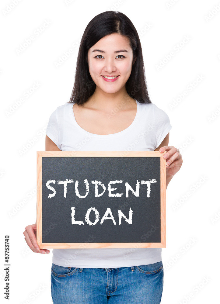 Student with chalkboard showing phrase student loan Student with chalkboard showing phrase student loan