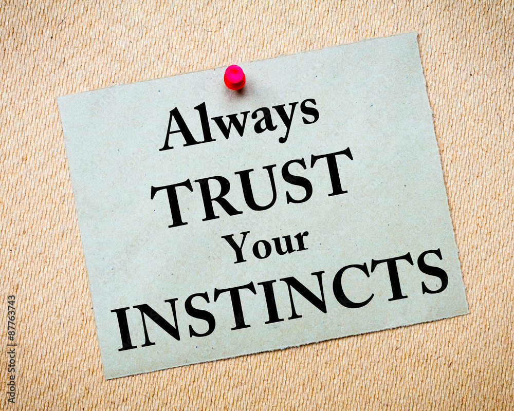 Always Trust Your Instincts Message written on paper note