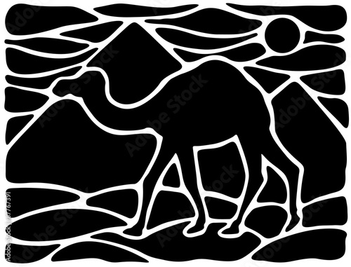 Silhouette of a walkihg dromedary