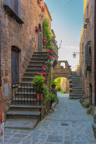 Fototapeta Naklejka Na Ścianę i Meble -  Stairs to the houses in old italian town