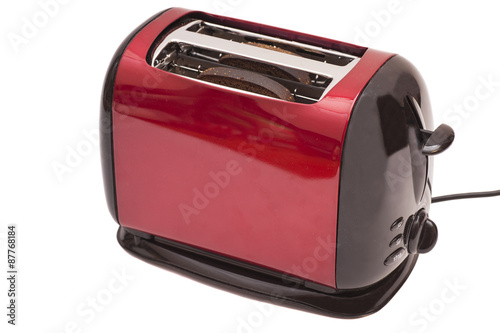 Red toaster and two slices of bread isolated on white