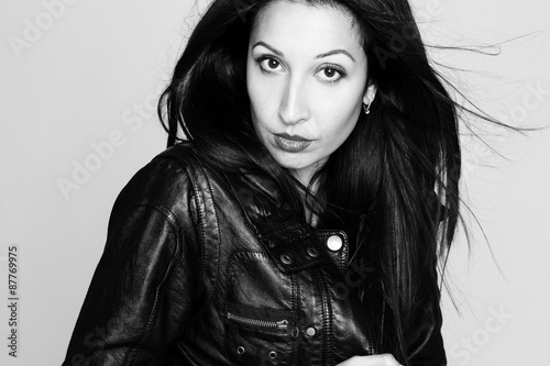 Portrait of sexy beautiful young woman in leather jacket