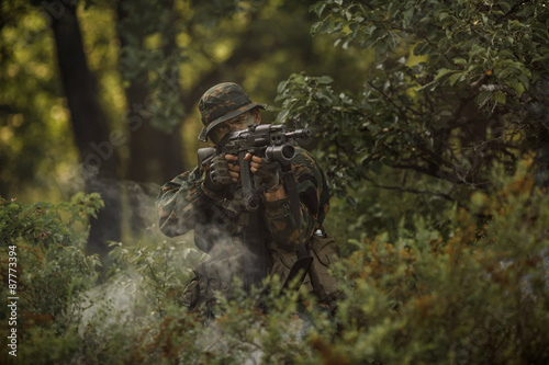 paratrooper airborne infantry in the forest © kaninstudio