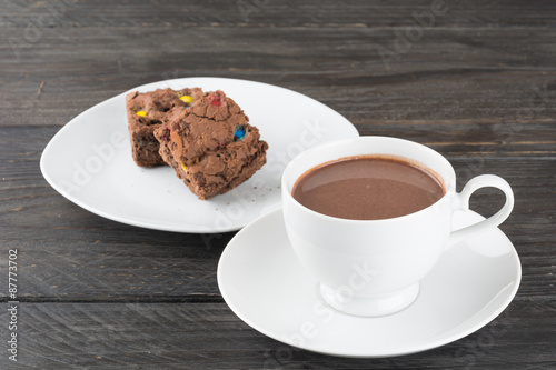 a cup of chocolate with brownie