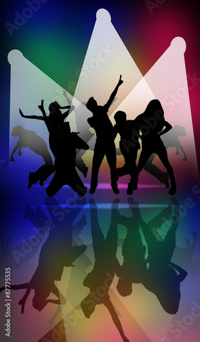 Silhouettes of dancing people on bright color dance floor