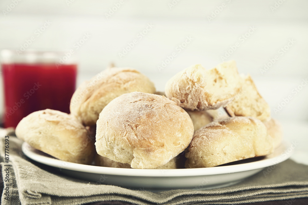 Fresh homemade bread buns on table, close-up
