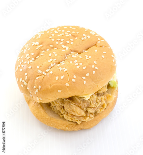 chicken fried burger on white background
