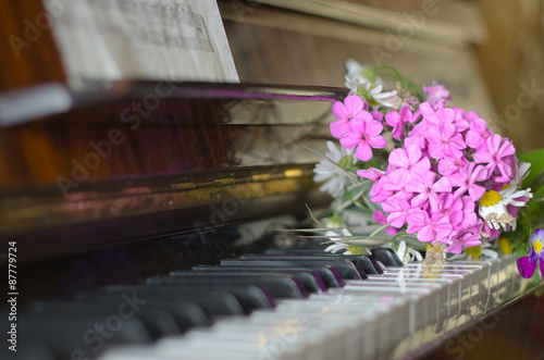 bouquet of summer flowers on a piano