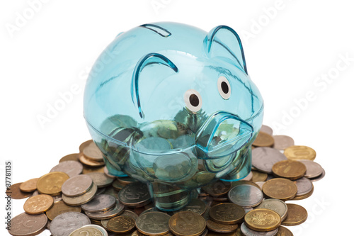 Glass Piggy Bank And Coins photo