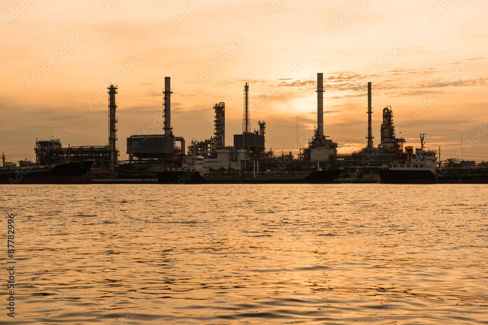 Oil indutry refinery - factory with dramatic sunrise