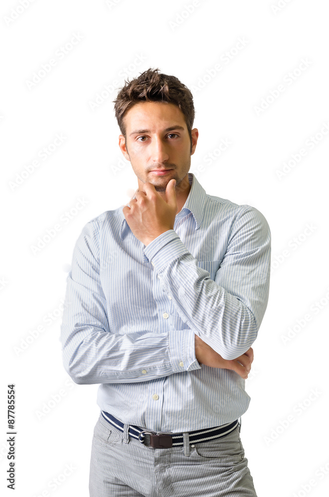 Handsome young businessman looking at camera, isolated Handsome young businessman looking at camera, isolated