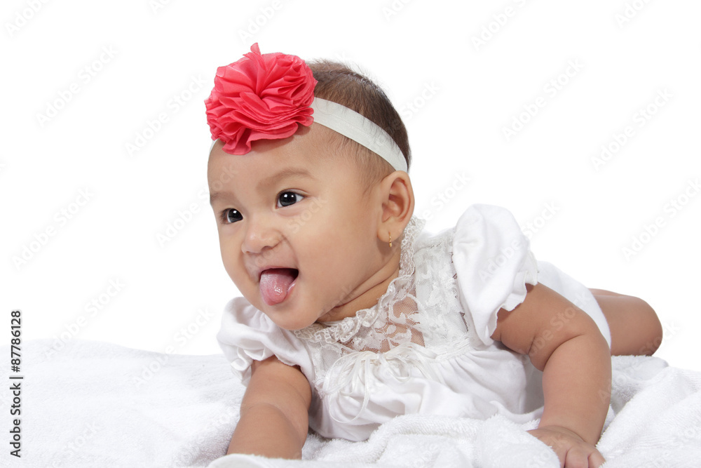 Portrait of happy little baby crawling in bed, isolated on white background Portrait of happy little baby crawling in bed, isolated on white background