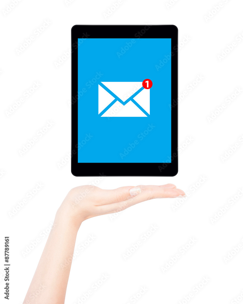 Female hand shows tablet computer with message notification Female hand shows tablet computer with message notification