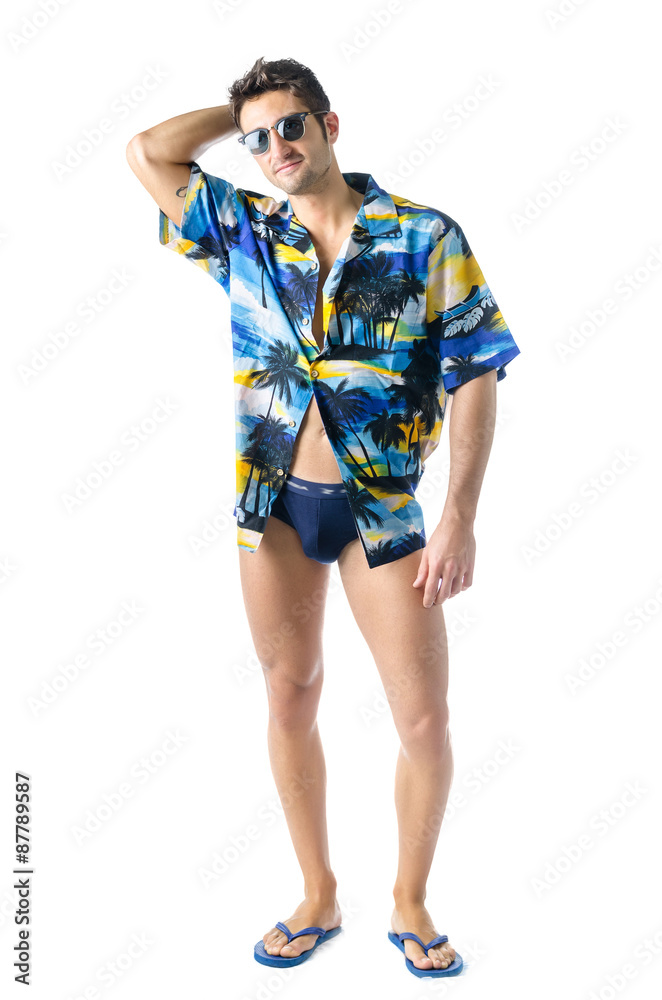 Handsome, athletic young man with open shirt and swimming suit Handsome, athletic young man with open shirt and swimming suit